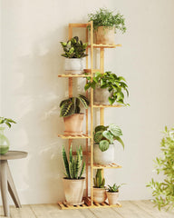 Bamworld Bamboo Plant Stand with various plants displayed
