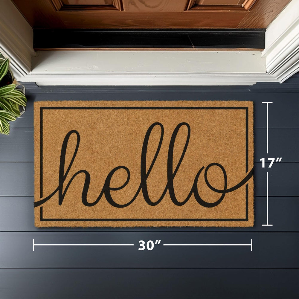Barnyard Designs Doormat placed on a porch with plants around