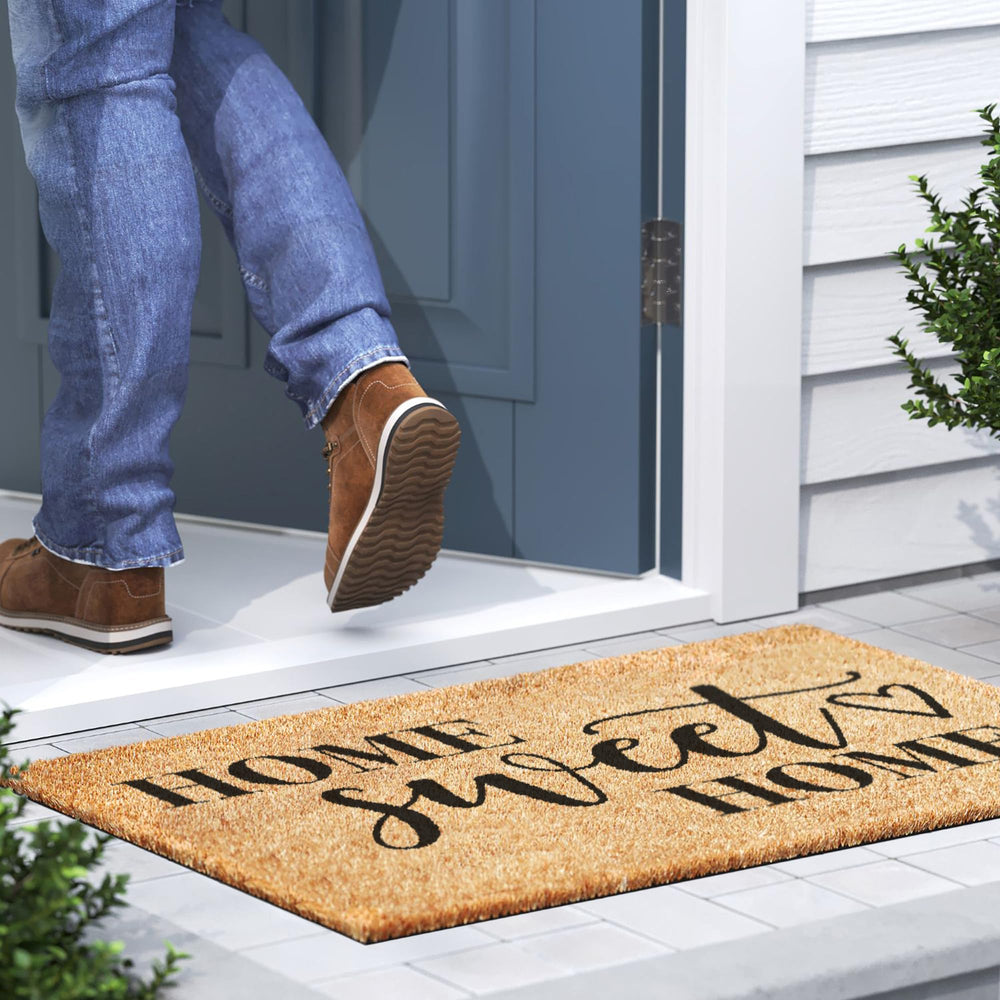 Barnyard Designs Home Sweet Home Doormat on wooden porch