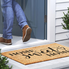 Barnyard Designs Home Sweet Home Doormat on wooden porch