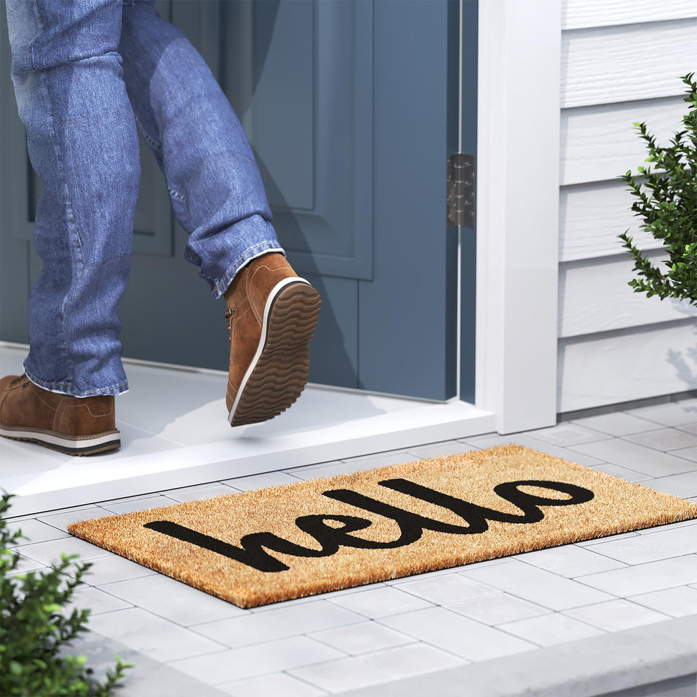 Barnyard Designs Thick Hello Welcome Mat on wooden porch
