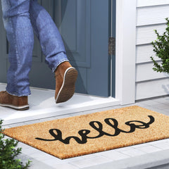 Barnyard Designs Welcome Mat displayed at a front door