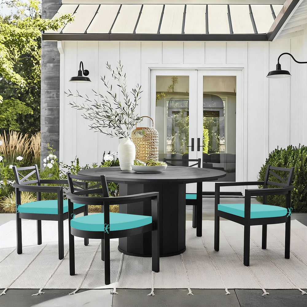 Basic Beyond outdoor chair cushions set on a garden table