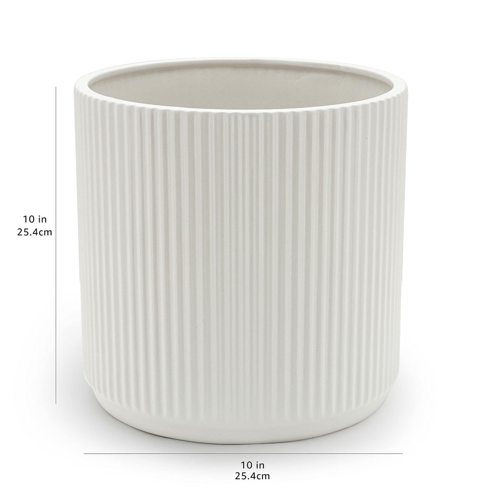 Basics 10-inch ceramic planter in garden setting