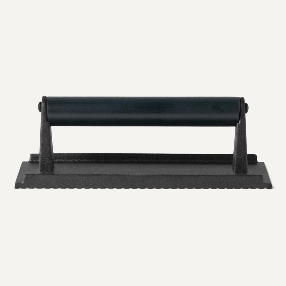 Basics Burger Press in use on a grill with patties