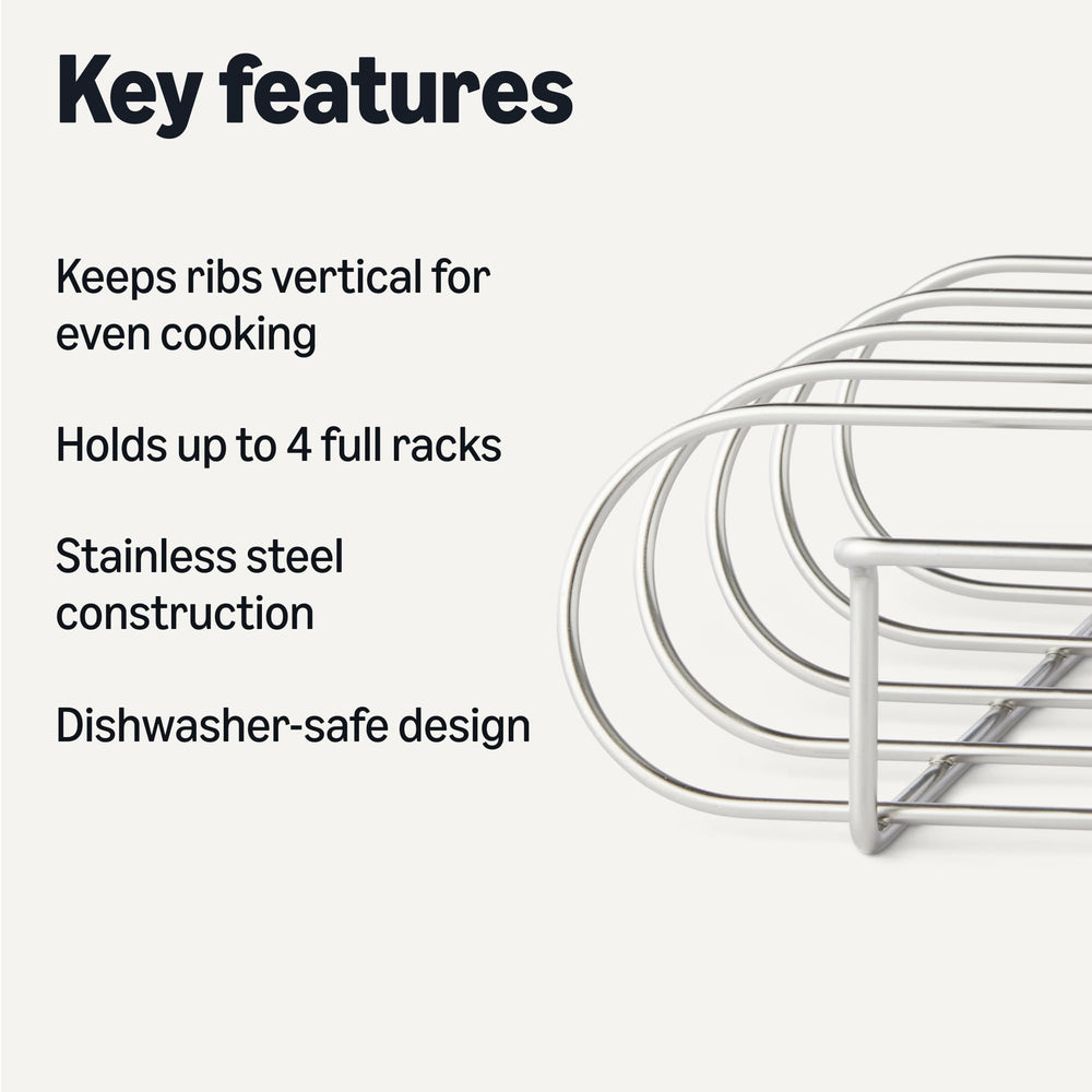 Basics Rib Rack holding four racks of ribs, grilling outdoors