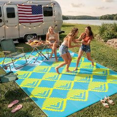 Beeiva Outdoor Rug 8x10 laid out on a patio with outdoor furniture