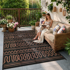 Beeiva Outdoor Rug 8x10 on patio with outdoor furniture