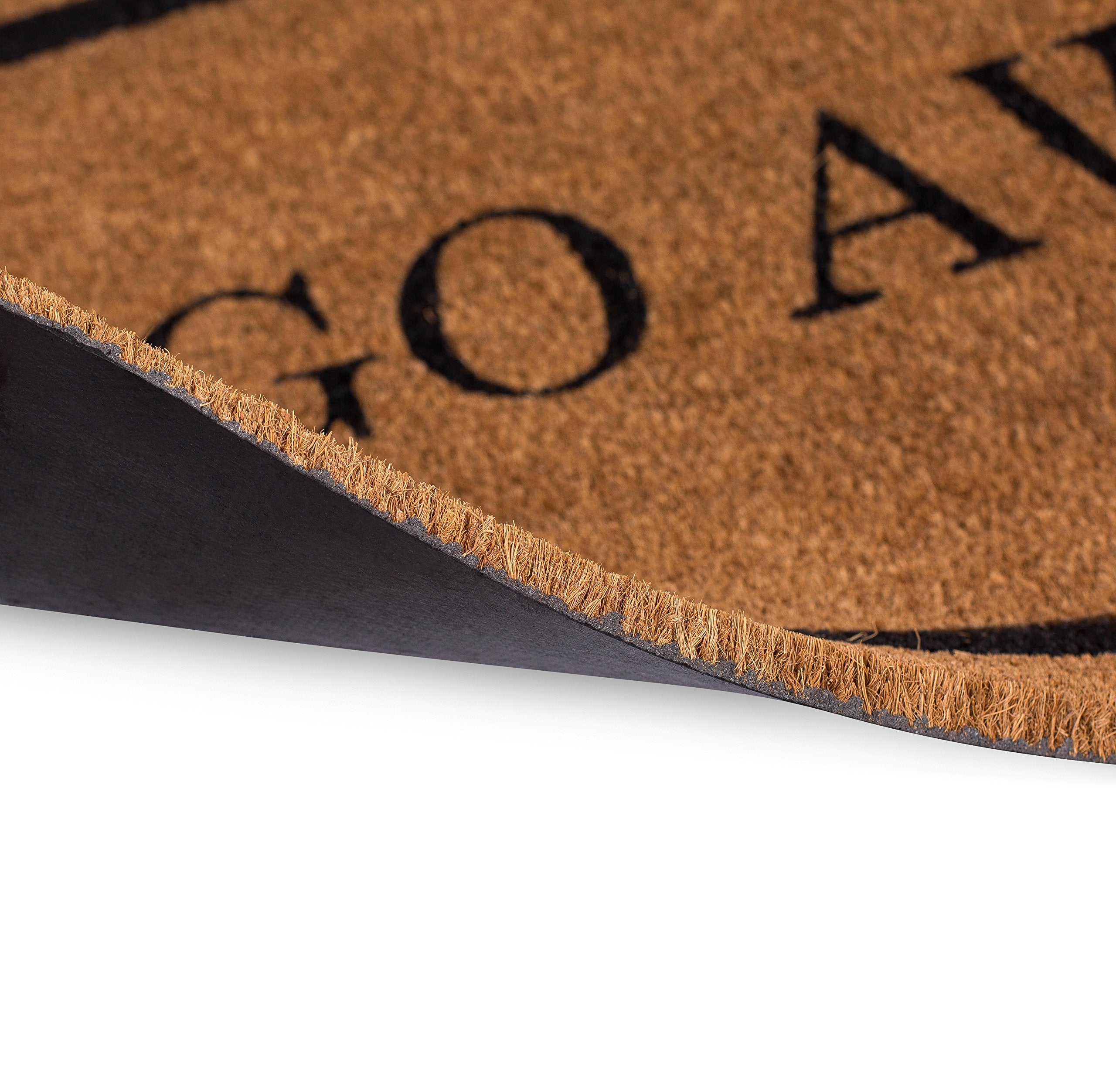 BIRDROCK HOME Go Away Coir Doormat with dirt being removed