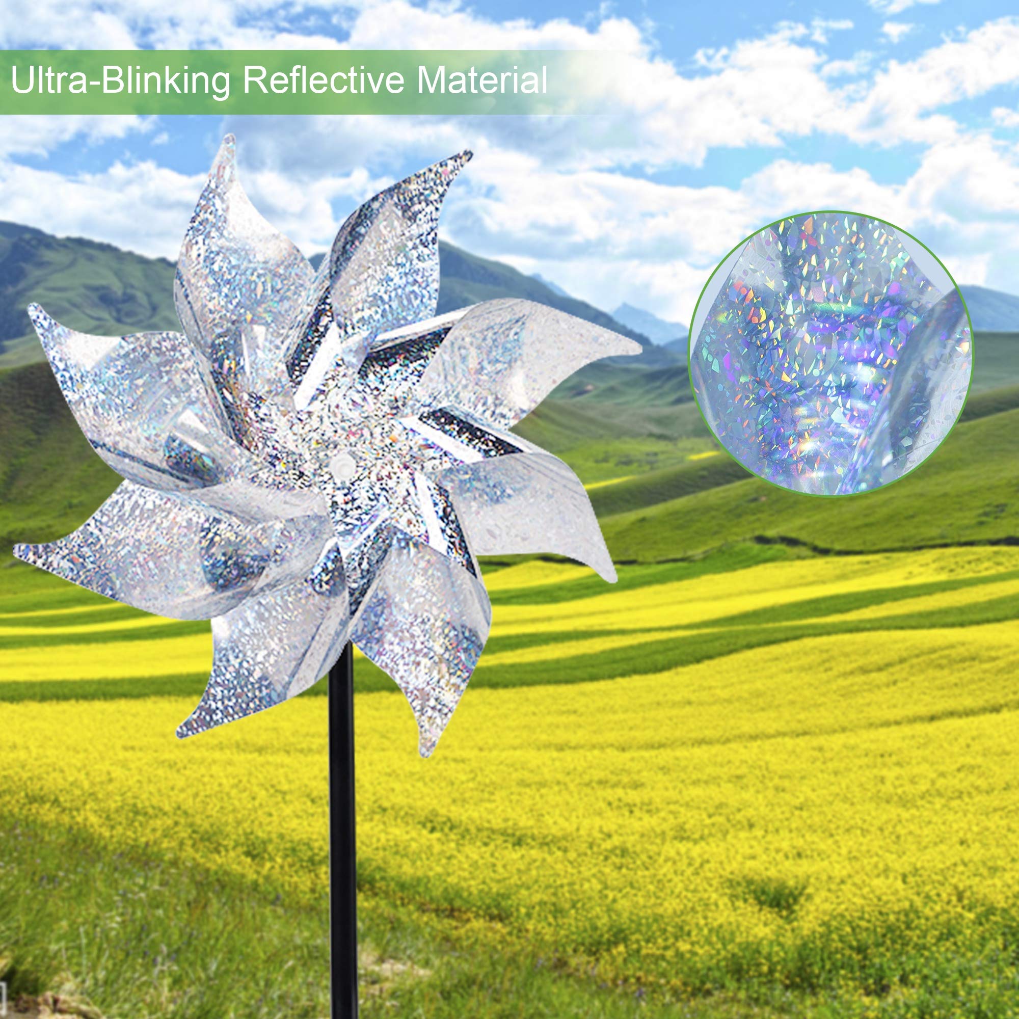 Birds being deterred by silver reflective pinwheels in a garden