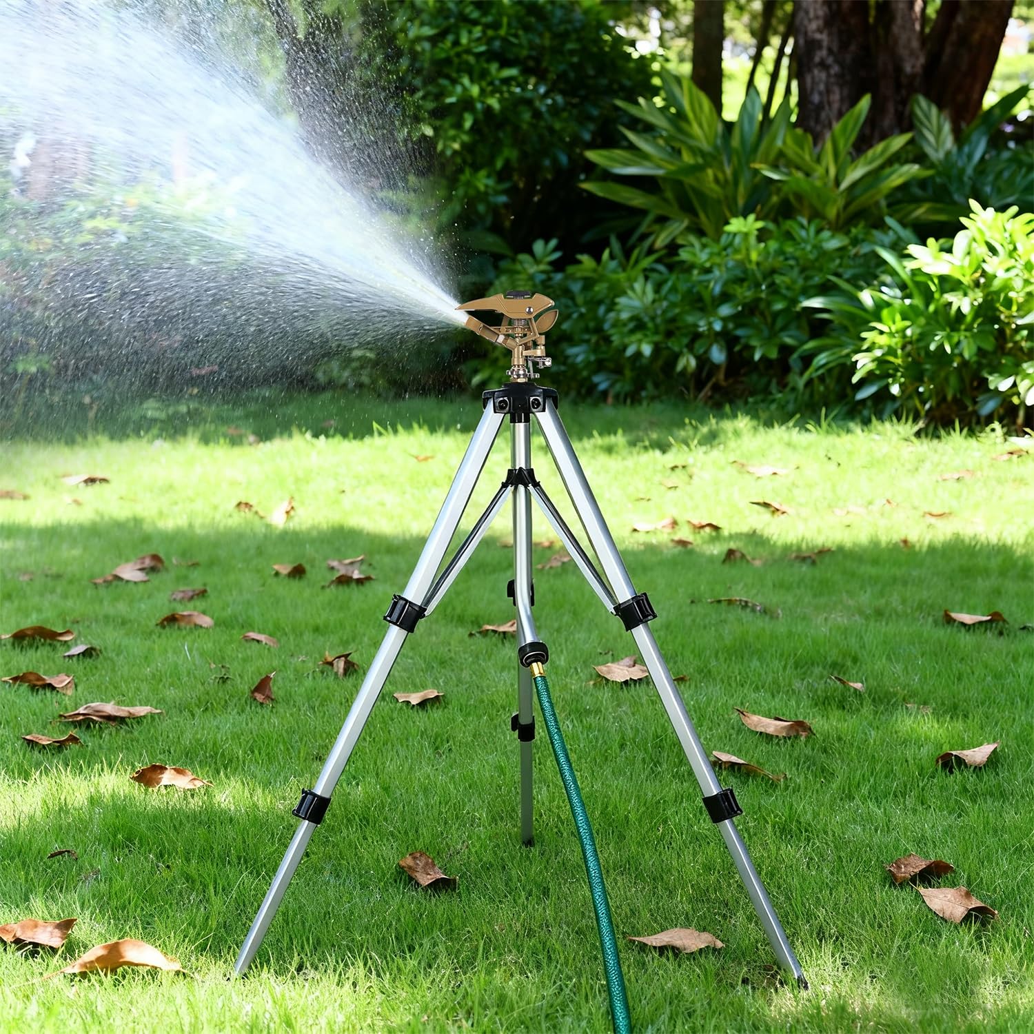 Biswing tripod sprinkler in a garden setting