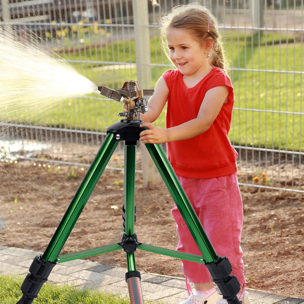 Biswing Tripod Sprinkler set up in a garden