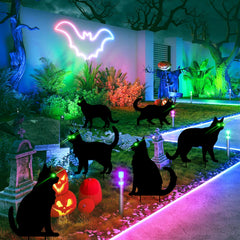 Black cat yard sign with glow-in-the-dark eyes