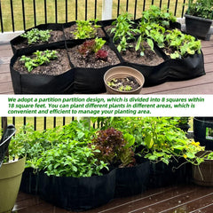 Black CJGQ Fabric Raised Garden Bed filled with soil