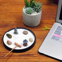 Black round base of the Nature's Mark Mini Zen Garden
