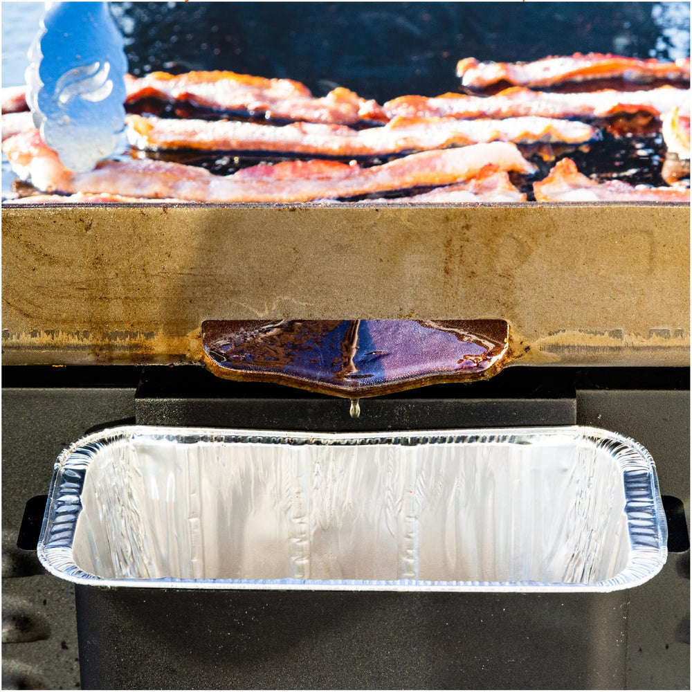 BLACKSTONE Grease Liners displayed with cooking ingredients