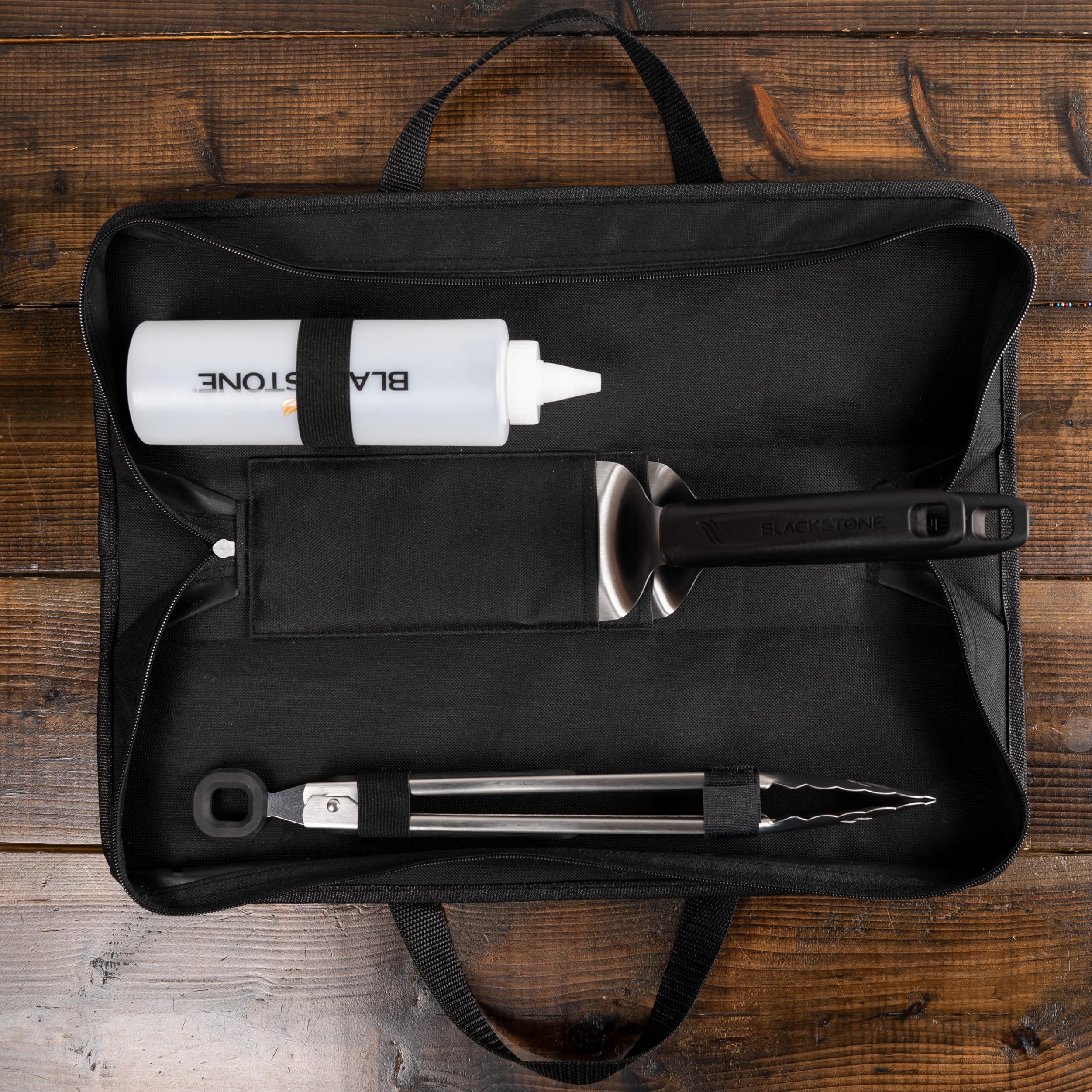 BLACKSTONE griddle toolkit side view showing spatulas and tongs