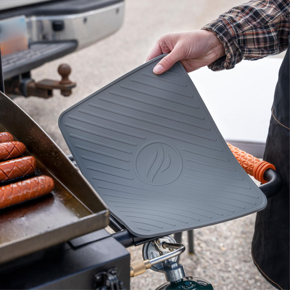 BLACKSTONE spatula mat with grilling tools placed on it