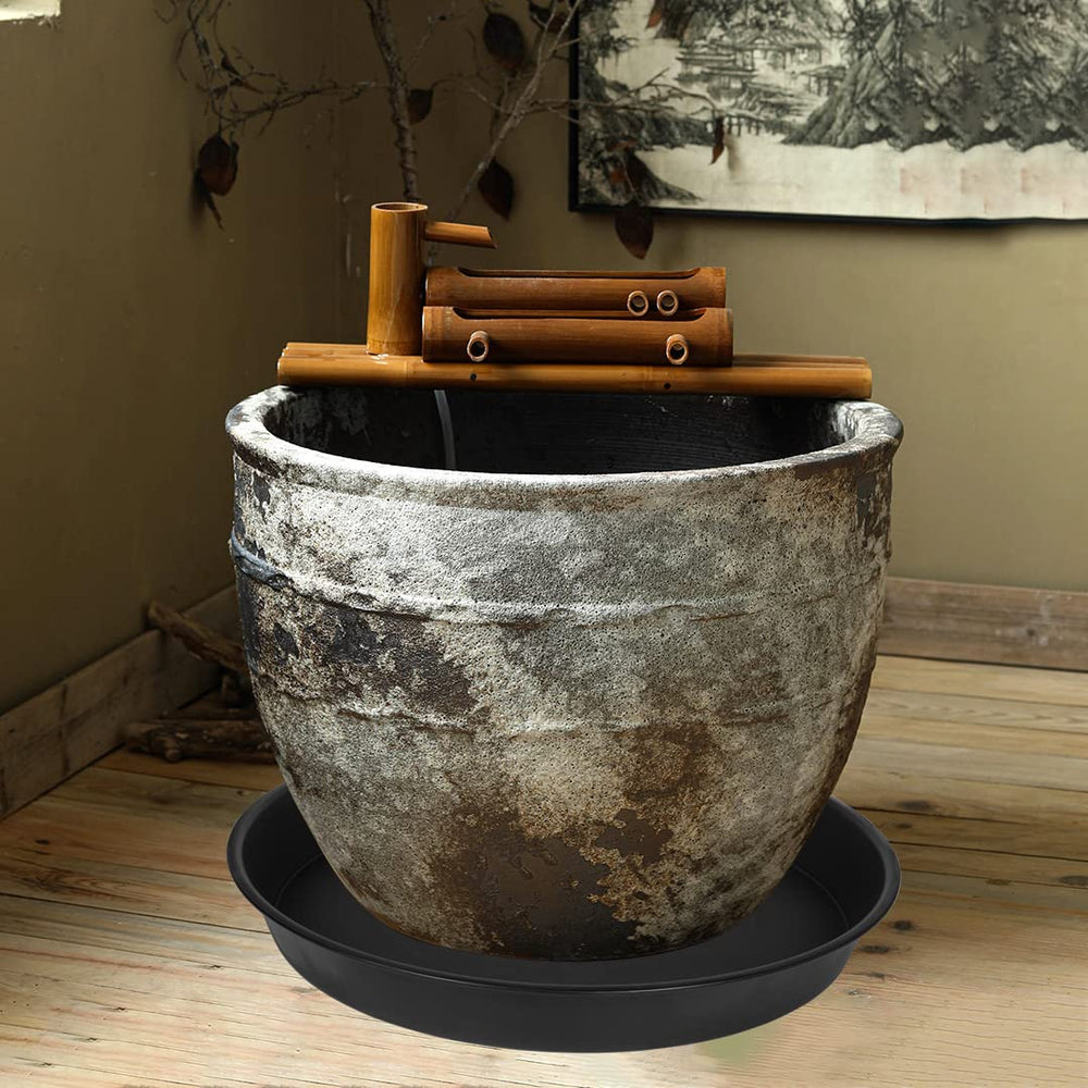 Bleuhome plant saucer as a birdbath in garden