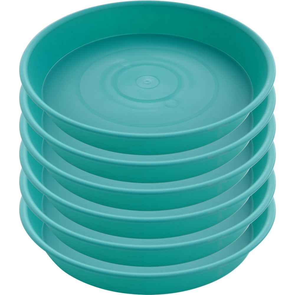 Bleuhome Plant Saucer next to various planters