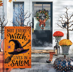 BLKWHT Halloween Garden Flag displayed on a garden stand