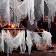 Boao Halloween Cheesecloth hanging from a tree for outdoor display