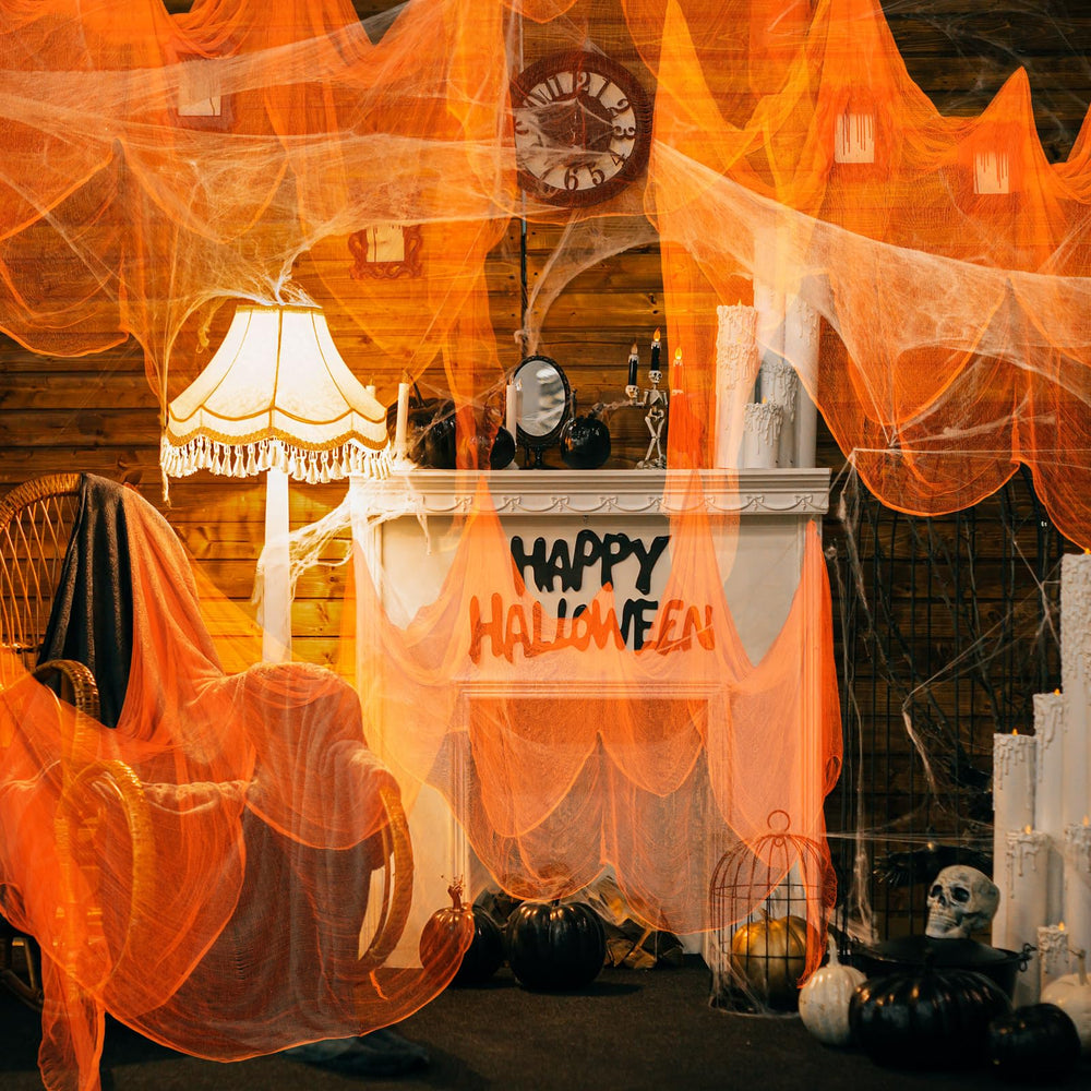 Boao Halloween Orange Cheesecloth hanging from a porch