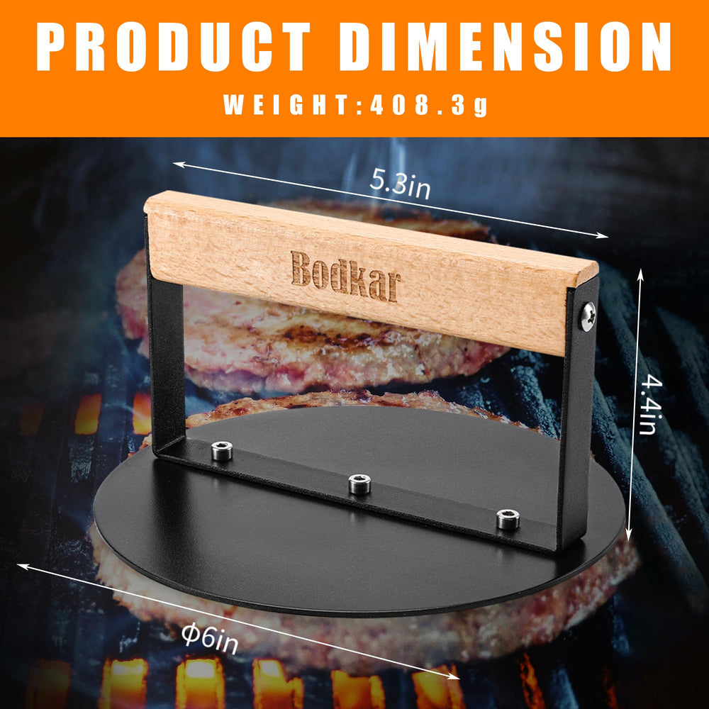 bodkar burger press in use, flattening a burger