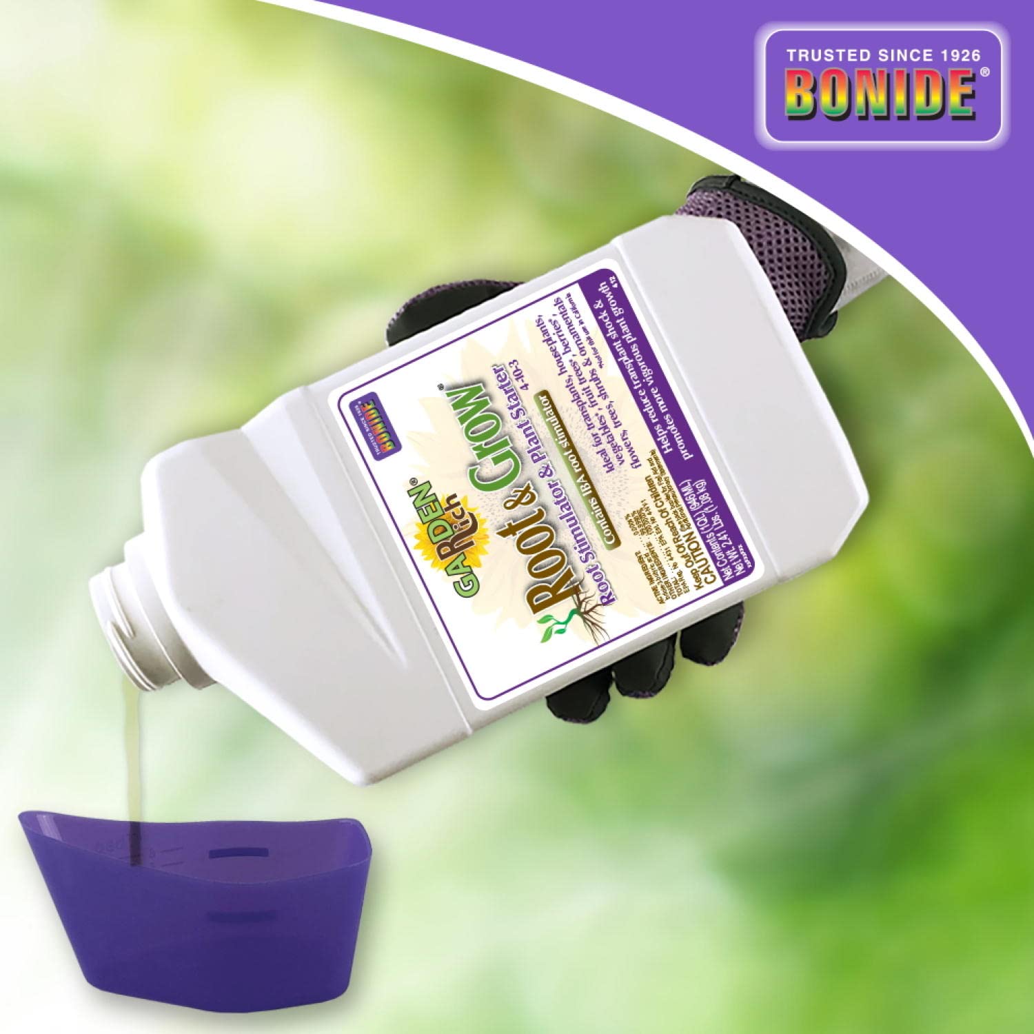 Bonide Root & Grow application on soil around plants