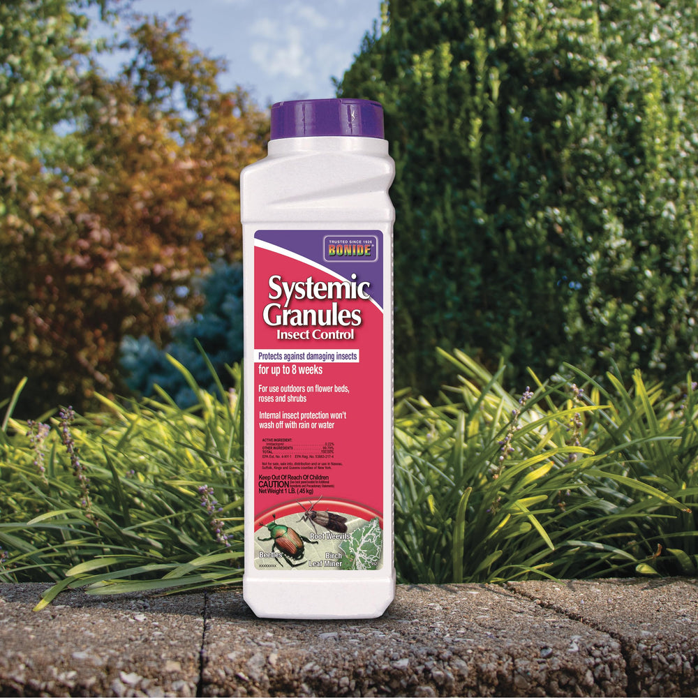 Bonide Systemic Insect Control Granules in a garden setting with plants