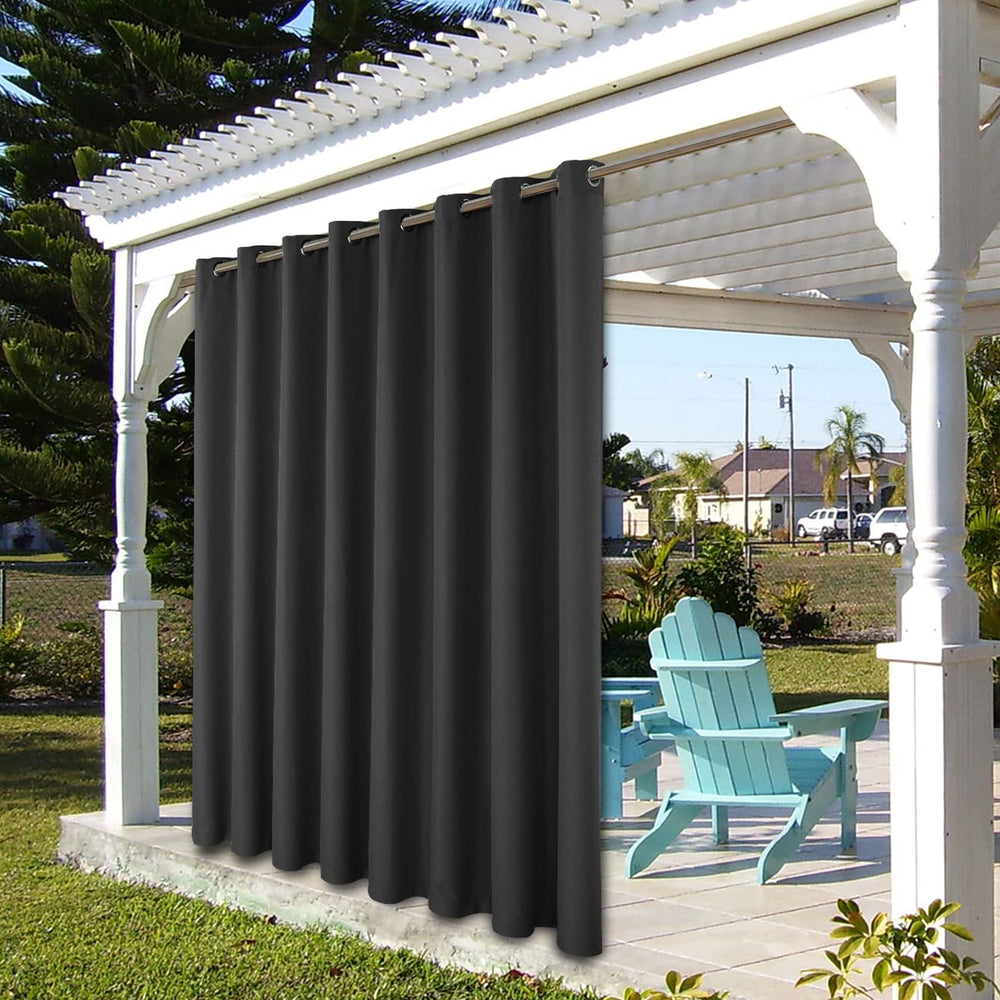 BONZER Outdoor Curtain Charcoal draped over a balcony railing