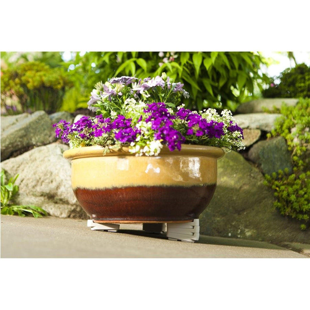 Bosmere Pot Toes black in use under a planter