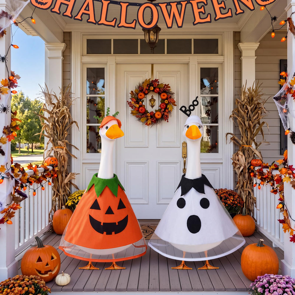 Both Halloween costumes displayed on a lawn goose
