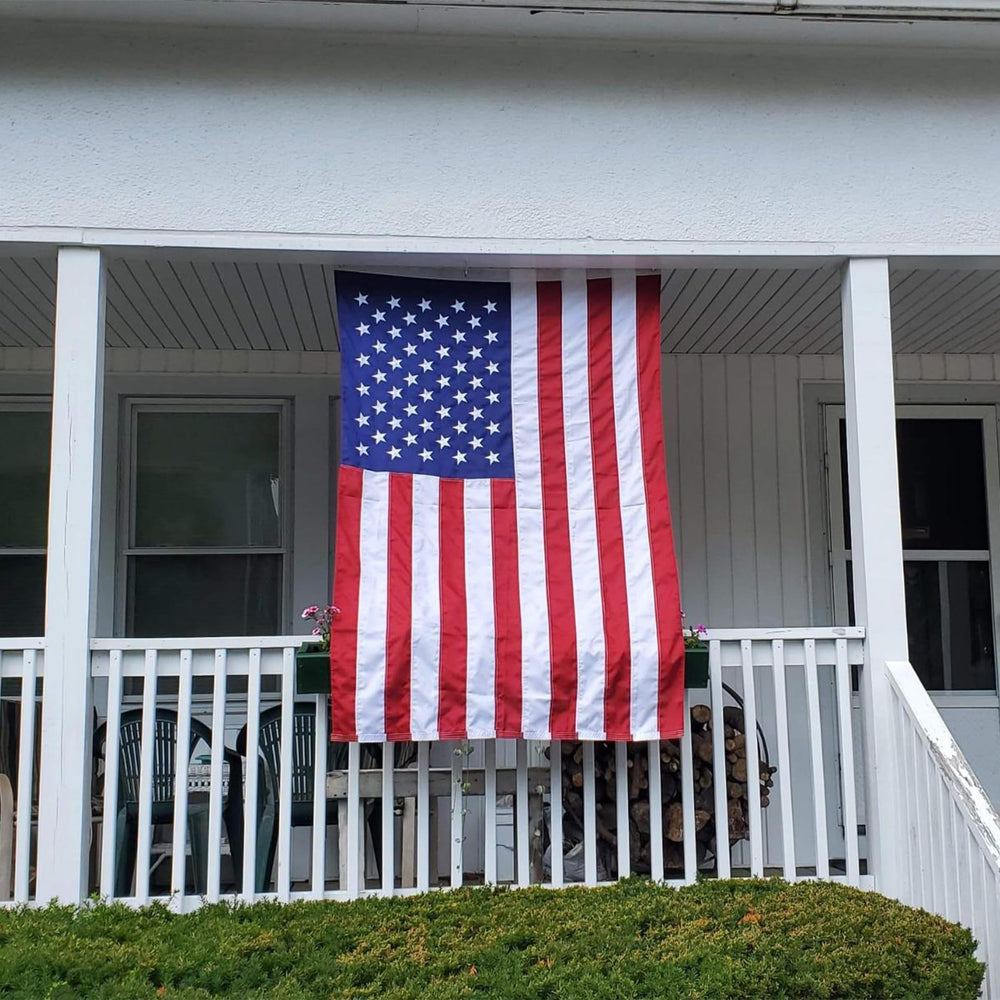 Bradford American Flag 5x8 ft in a garden setting