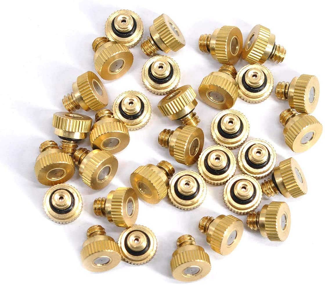 Brass misting nozzle installed in a garden system