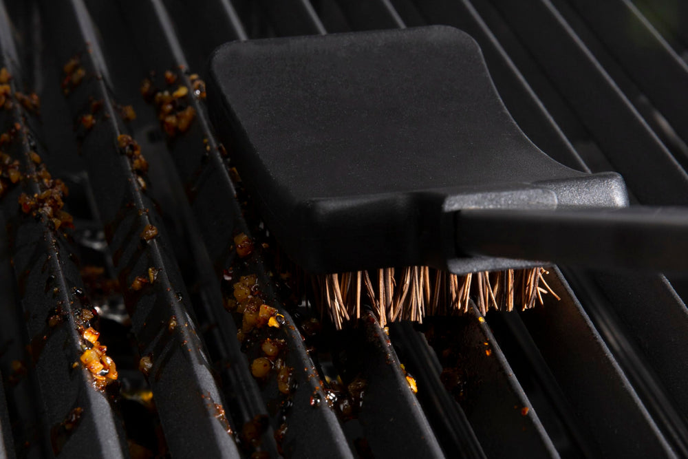Broil King replacement heads in use on a warm grill