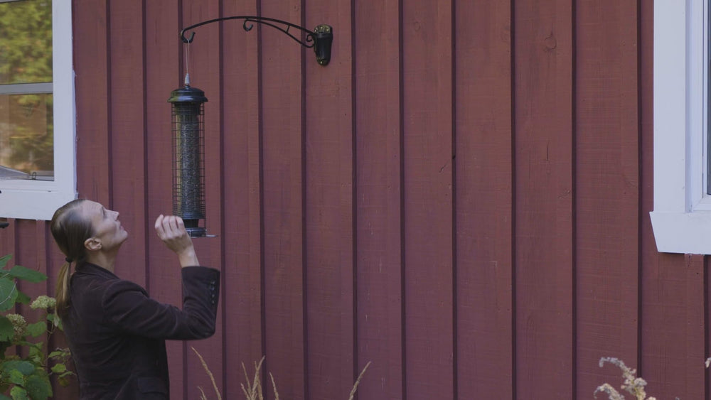 Brome Squirrel Solution 150 Bird Feeder seed ports close-up