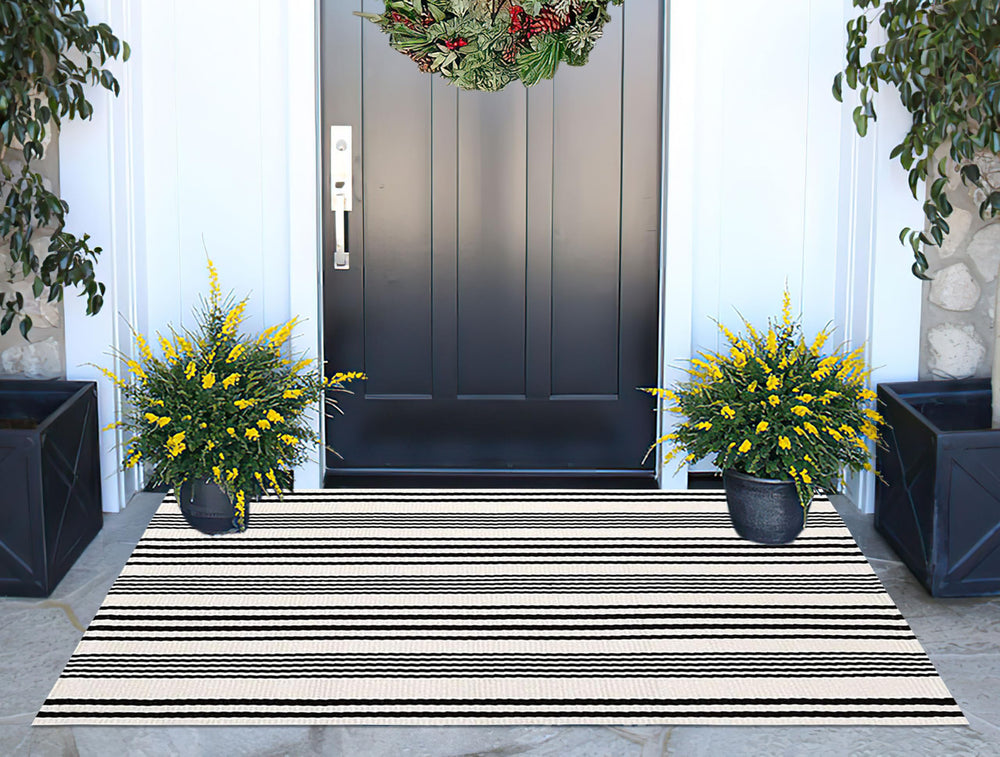 BUAGETUP Black and White Striped Outdoor Rug in living room