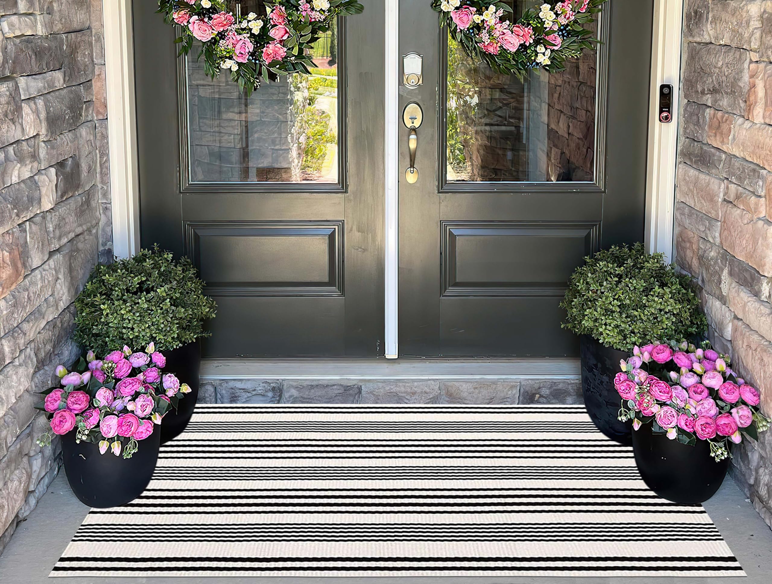 BUAGETUP Black and White Striped Outdoor Rug inside laundry bag