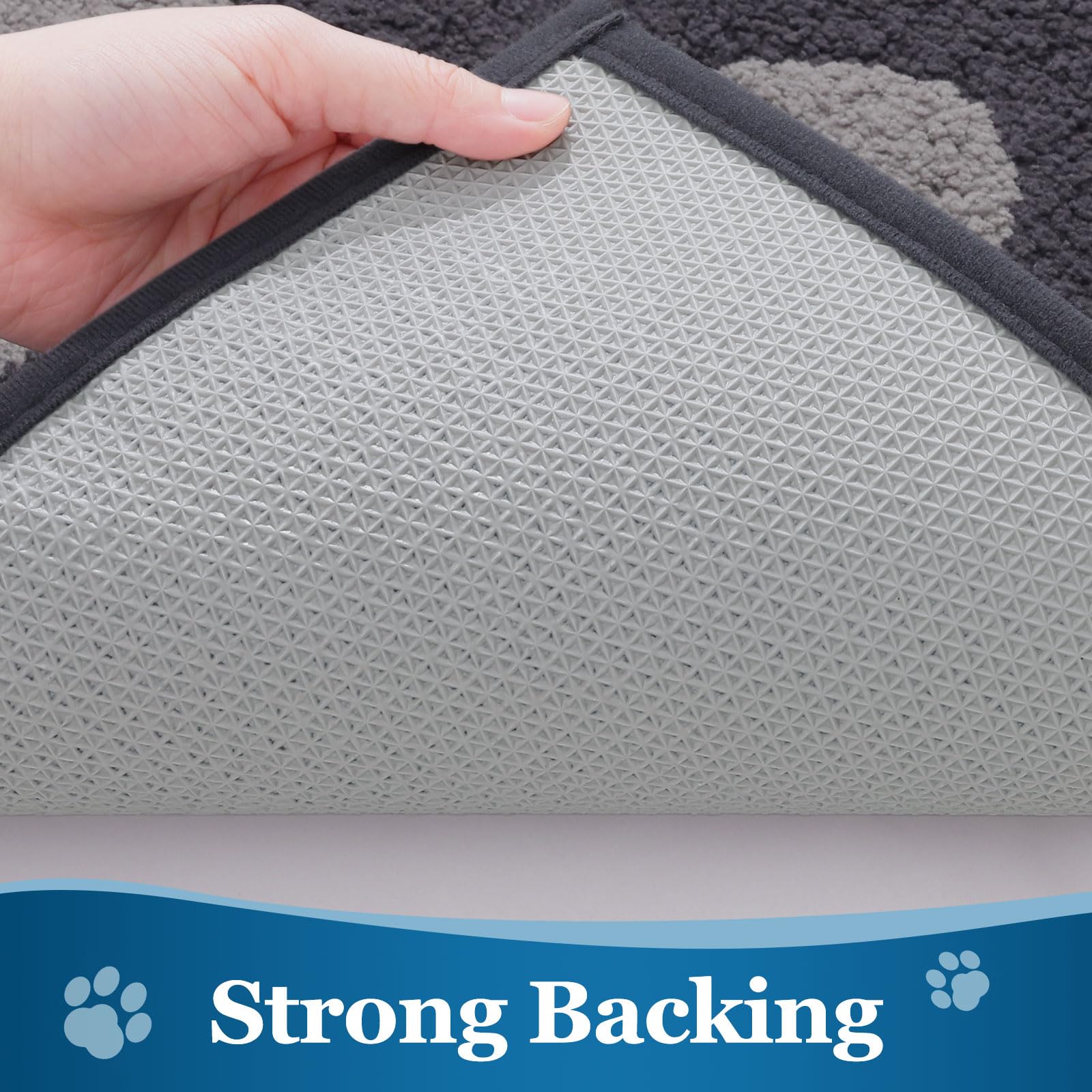 Buganda Dog Door Mat 30x20 dark grey in a home entryway