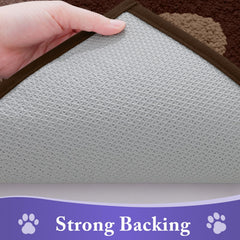 Buganda Dog Door Mat placed in entryway with muddy paws