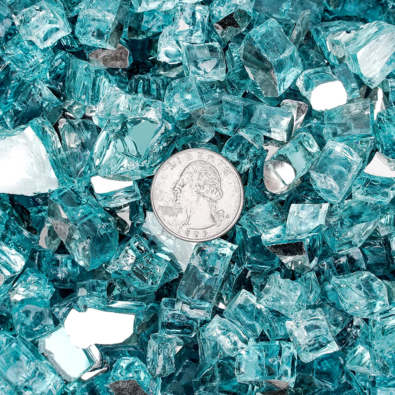 Burning fire pit with onlyfire Aqua Blue fire glass