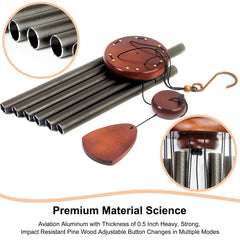 Bursvik chimes hanging on a patio against a garden background