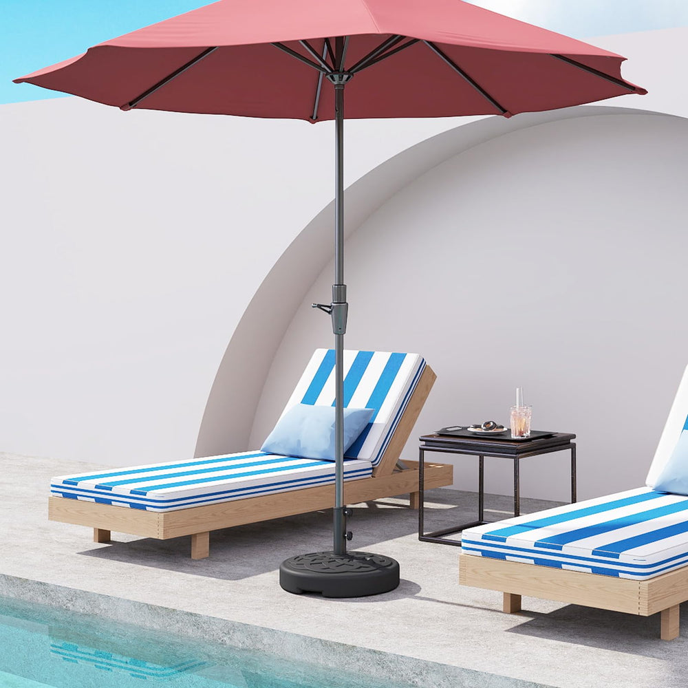 C-Hopetree umbrella base on a patio with an umbrella