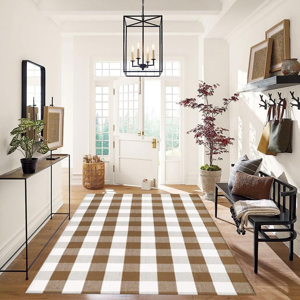 CAINANEL Buffalo Plaid Outdoor Rug on a patio with autumn decor