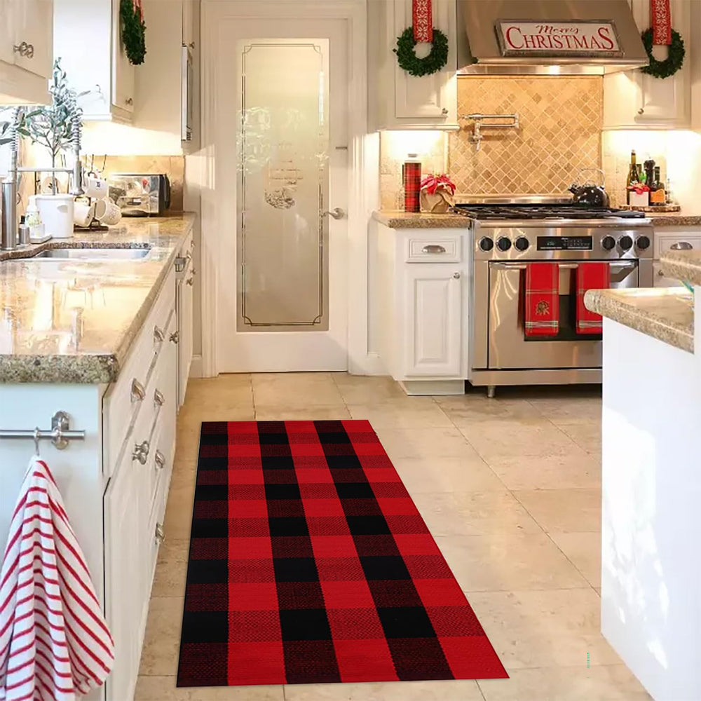 CAINANEL Christmas Door Mat on a porch with decorative elements