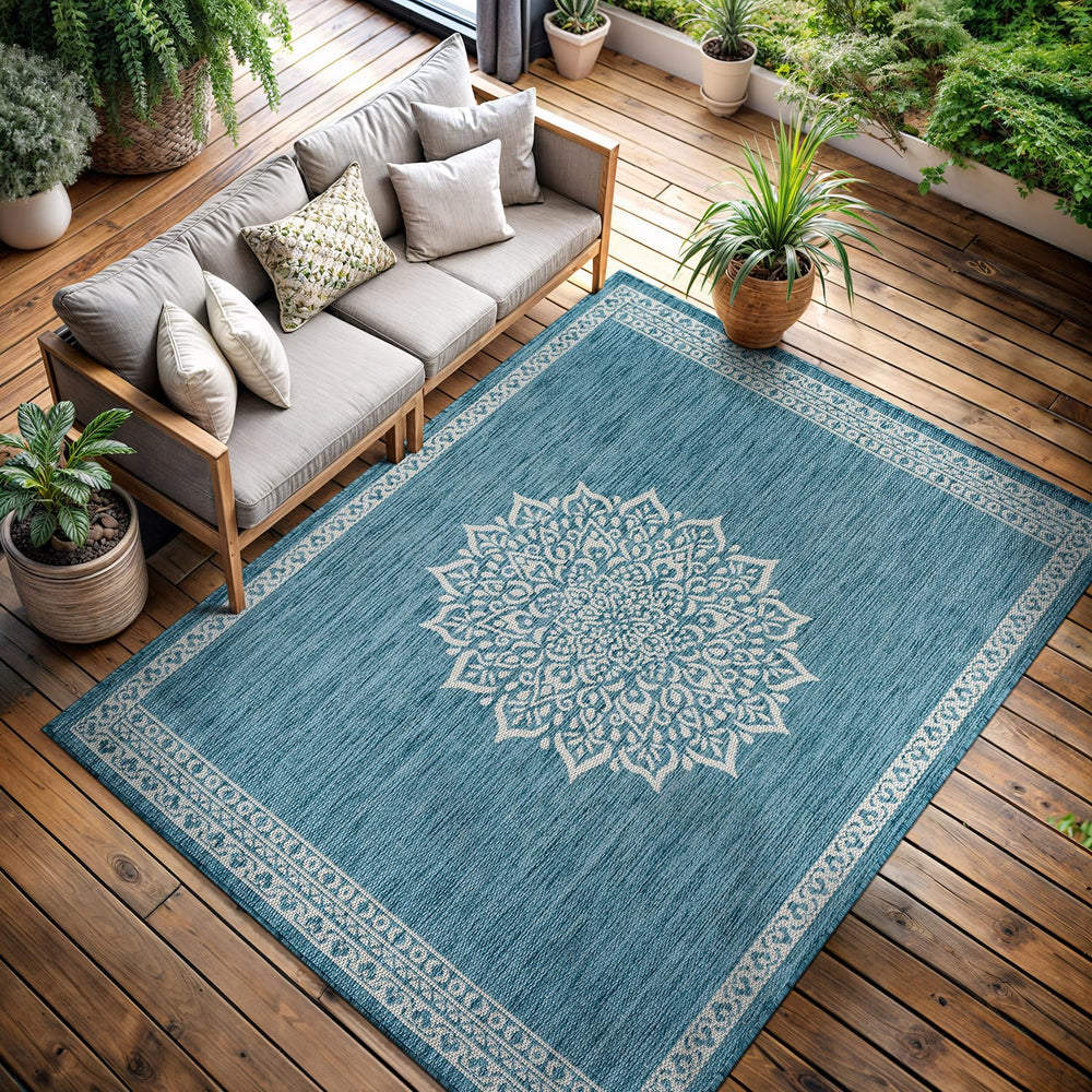 CAMILSON Outdoor Rug 6x9 Medallion Aqua with furniture