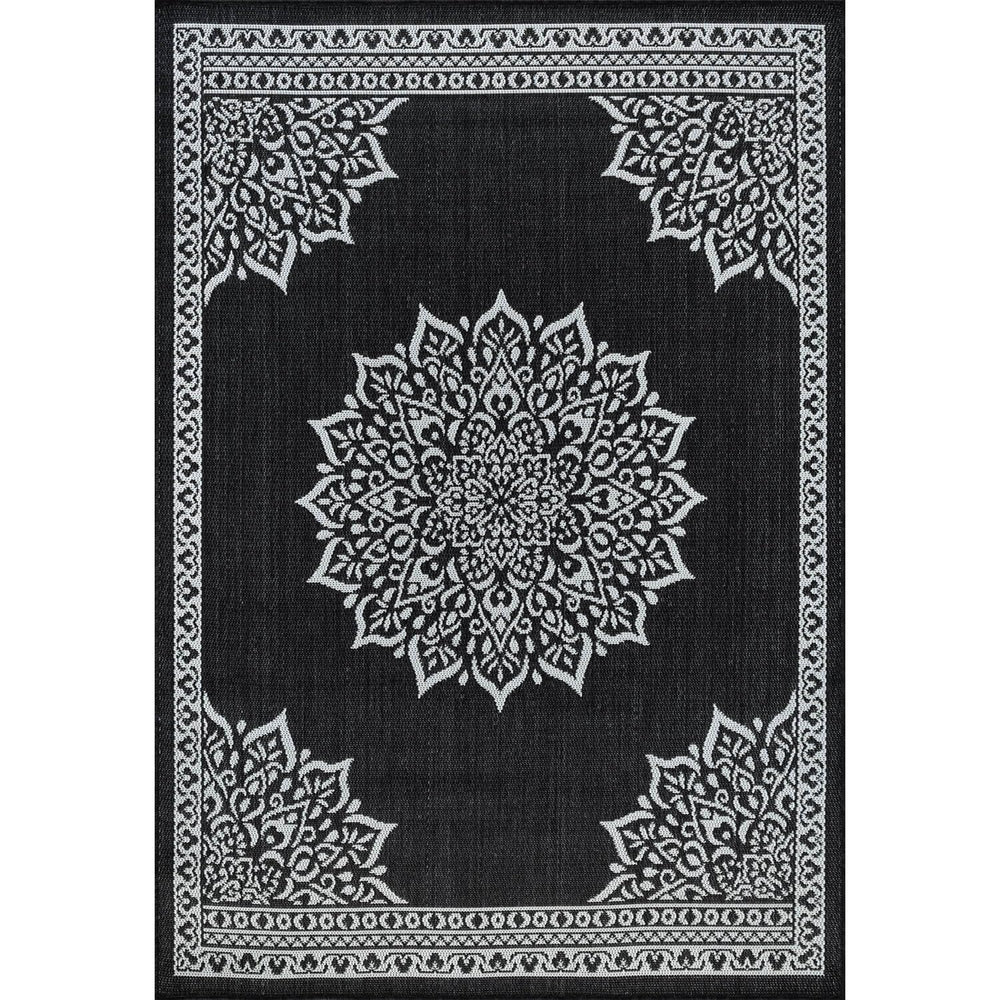 CAMILSON Outdoor Rug 6x9 Medallion Black in a garden setting