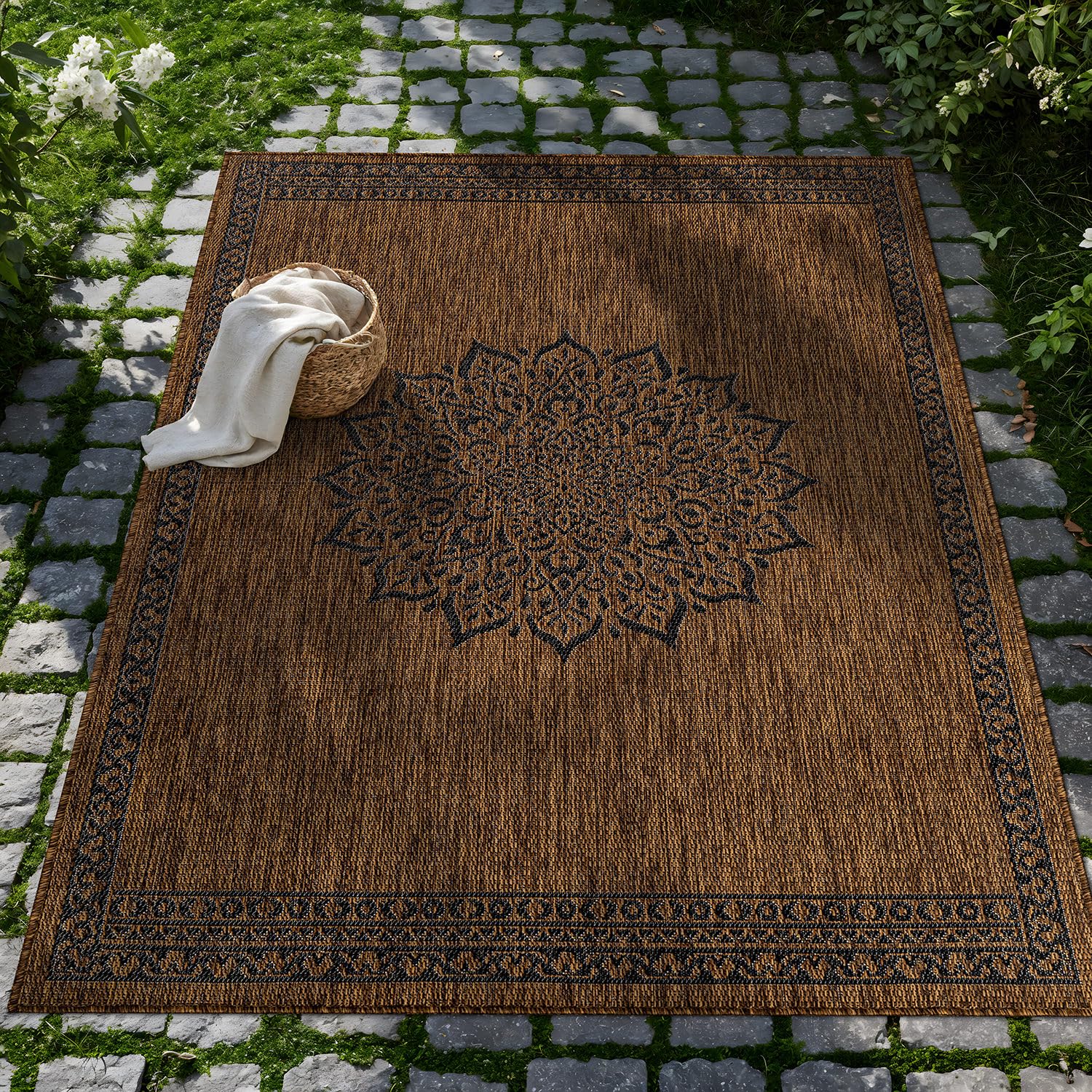 CAMILSON Outdoor Rug 6x9 Medallion Gold laid out indoors