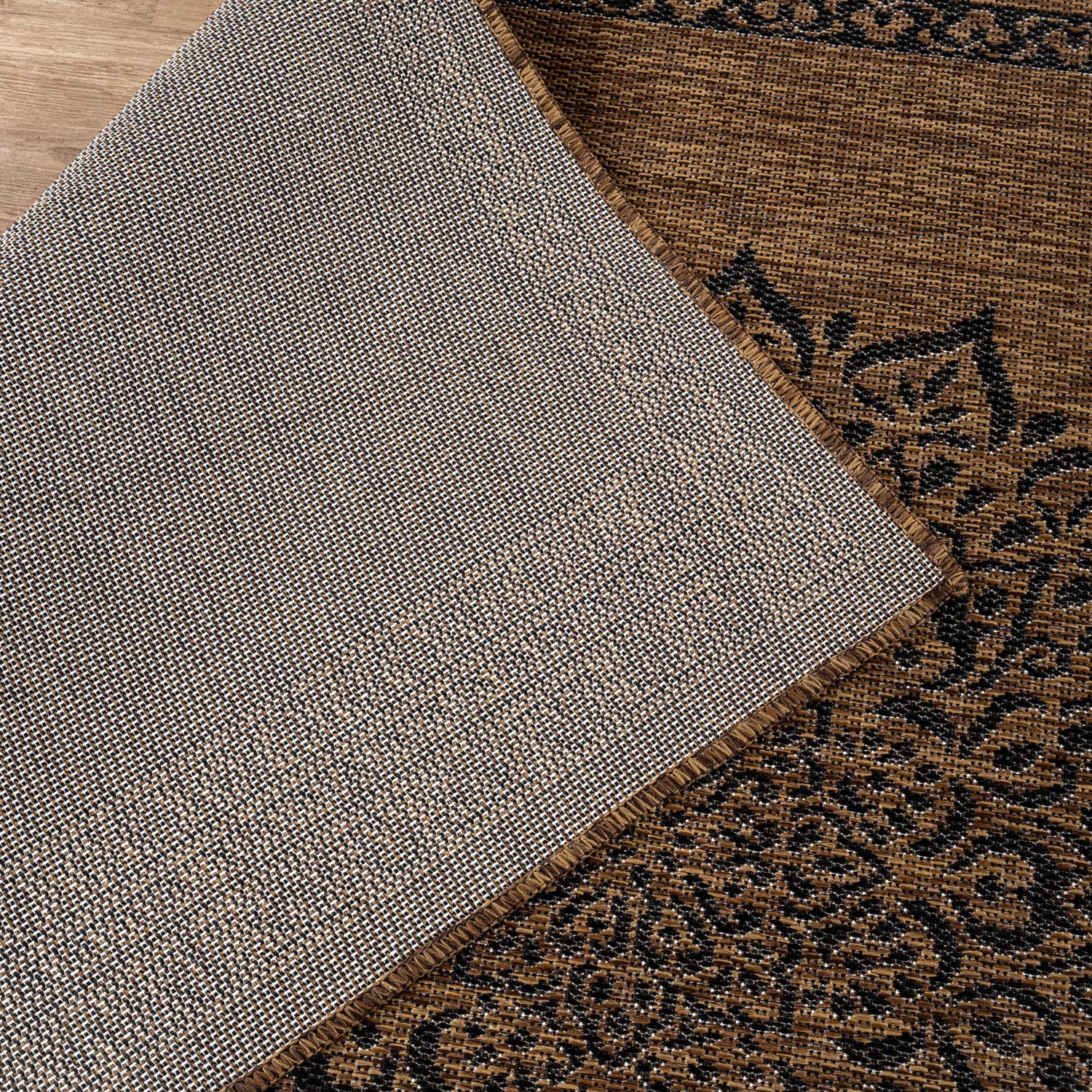 CAMILSON Outdoor Rug 6x9 Medallion Gold rolled up
